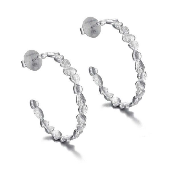 Hoop earrings with an irregular texture in 925 sterling silver
