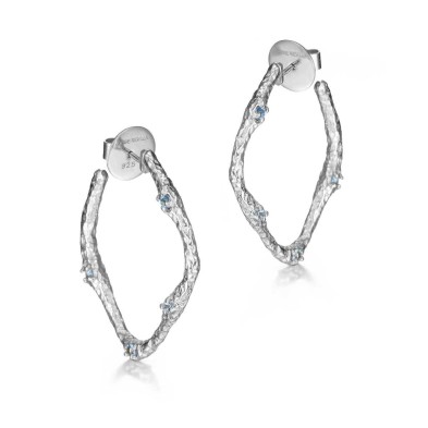 Irregular sterling silver hoop earrings with blue topaz